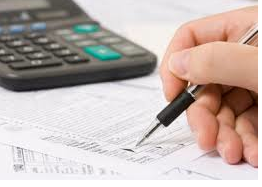 Kan. woman pleads guilty to preparing false tax returns for prison Inmates