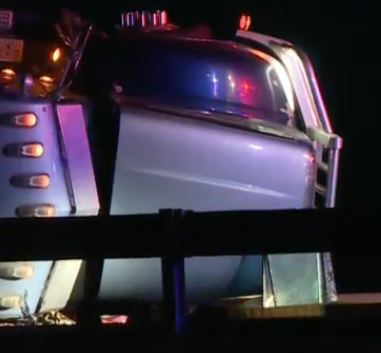 Driver hospitalized after cattle truck overturns on Kansas highway