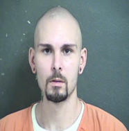 Hearing moved for man charged in shooting death of Kan. detective