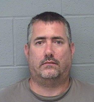 Kan. man enters plea in death of art professor hit riding her bicycle