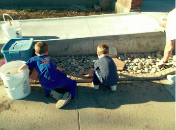 Early Childhood Connections students complete rock garden