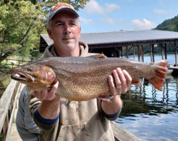 Kansas man catches record trout in Arkansas
