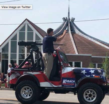 Kansas town says Kobach can’t use replica gun in parade