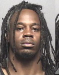 Police: Kan. man accused of taking bank deposit bag in custody