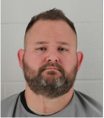 The Latest: Officer tried to keep victims quiet after Kan. cop threat