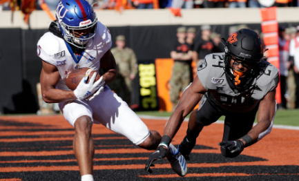 Hubbard leads No. 25 Oklahoma St. past Kansas